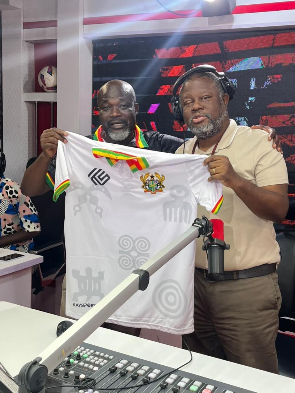 Kaysports presents branded Ghana sports jersey to Sporty FM's Fiifi Banson