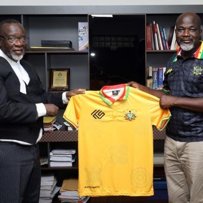 Ghana's Chief Justice, Paul Baffoe Bonnie receives Kaysports branded Ghana jerseys from CEO Kwame Owusu-Ameyaw